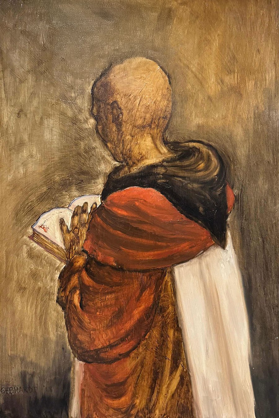 The Monk Back view of monk reading book