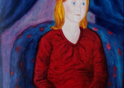 Portrait of woman in red dress sitting in polka dotted chair, looking serenely off into distance, and resting hands in lap